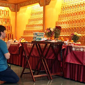 Ceremony in Ancenstral Hall, Buddha Tooth Relic Temple in Chinatown, Singapore