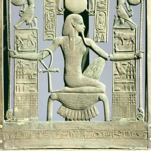 Detail of the back of a chair decorated with royal names and with the spirit of millions of years