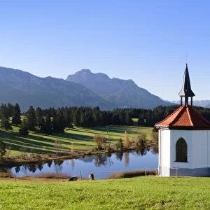 Chapel at Hergratsrieder See lake with Allgau Alps, near Fussen, Allgau, Ostallgau, Bavaria, Germany, Europe