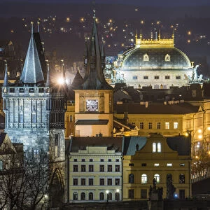 Charles Bridge East Tower and National Theatre at night, Prague, Czech Republic, Europe