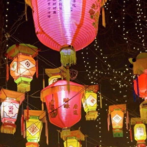Chinese park decorated with bright and colorful hand-made lanterns during Chinese New Year