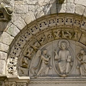 Christ in Majesty between two angels in Main porch of St. Sauveur Basilica built between the 12th and 15th centuries, Tomb of the heart of Dugesclin, Dinan, Brittany, France, Europe