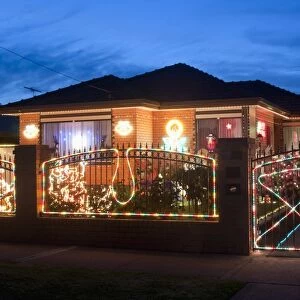 Christmas decoration of Melbourne suburban house at twilight, Altona suburb