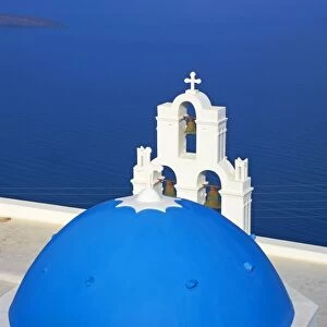 Church with blue dome overlooking the Aegean, Fira, Thira, Santorini, Cyclades, Greek Islands, Greece, Europe