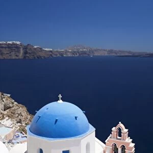 Church with blue dome with view of the Aegean Sea, Oia, Santorini, Cyclades, Greek Islands, Greece, Europe