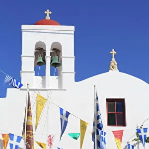 Church with flags in Mykonos Town, Mykonos Island, Cyclades, Greek Islands, Greece, Europe
