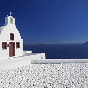 Church and white stones at Oia, Santorini, Cyclades, Greek Islands, Greece, Europe