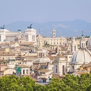 Churches and domes of the Rome skyline showing Victor Emmanuel II monument in the distance
