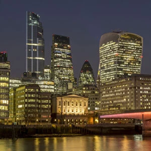 Cityscape with complete 22 Bishopsgate Tower and London Bridge dusk, London, England