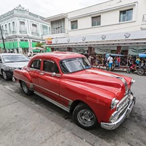 Classic 1950s Pontiac taxi, locally known as almendrones in the town of Cienfuegos