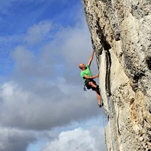 A climber tackles a very difficult rock climb in the Gorge d Aveyron, near St