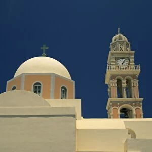 Close-up of a church dome and bell tower with clock