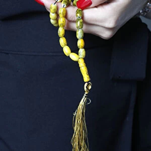 Close-up of Muslim woman holding Islamic prayer beads, Vietnam, Indochina, Southeast Asia
