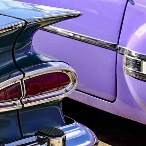 Close-up view of two colorful vintage cars, Havana, Cuba, West Indies, Central America