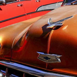 Close view of hood and hood ornament on a vintage car, Havana, Cuba, West Indies