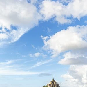 Clouds in the sky and grass in the foreground, Mont-Saint-Michel, UNESCO World Heritage Site
