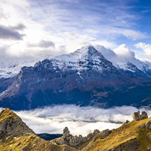 Cloudy sky over Mount Eiger seen from high mountains above Grindelwald in autumn