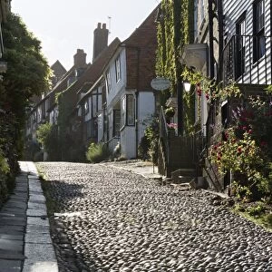 Cobblestone street and old cottages, Mermaid Street, Rye, East Sussex, England, United Kingdom