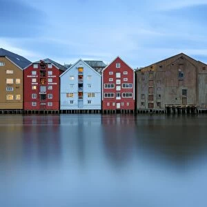 Colorful houses reflected in the River Nidelva, Bakklandet, Trondheim, Norway, Scandinavia