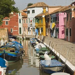 Coloured houses alongside canal