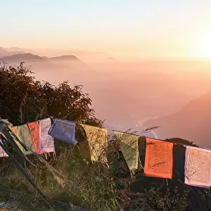 A colourful sunrise over the mountains of the Anapurna range, Australian Camp, Himalayas, Nepal, Asia