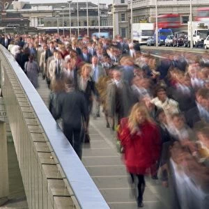 Commuter crowd crossing bridge, City of London, London, England, United Kingdom, Europe