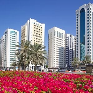 Contemporary architecture and Al Markaziyah Gardens and Fountain, Abu Dhabi, United Arab Emirates, Middle East
