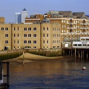 Converted wharves alongside the River Thames, Docklands, London, England