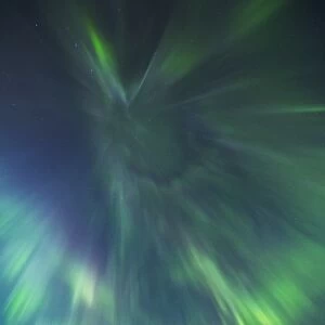 A coronal burst of aurora borealis (Northern Lights) during a solar storm in Northern