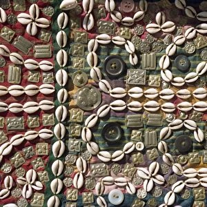 Cowries, beads and buttons