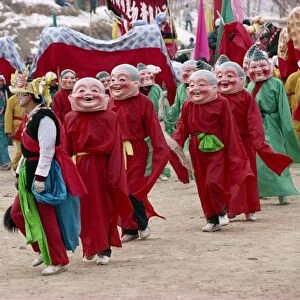 Crowds of costumed dancers celebrate Chinese New Year, Xining, Qinghai Province