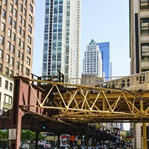 CTA train on the Loop track which runs above ground in downtown Chicago, Illinois