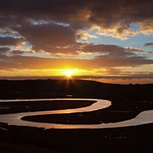 Cuckmere River meanders at sunset, near Seaford, South Downs National Park, East Sussex, England, United Kingdom, Europe