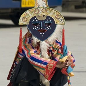 Dancer in traditional garb, Gyantse, Tibet, China, Asia