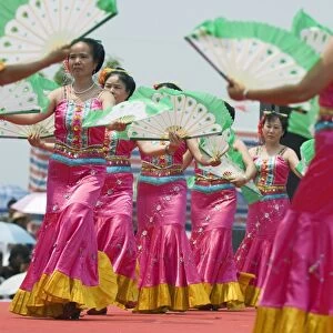 Dancers celebrating the Water Splashing Festival in Jinghong town, Xishuangbanna
