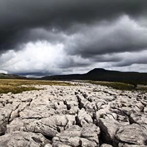 Dark clouds over Ingleborough from Twisleton Scar, Yorkshire Dales, North Yorkshire, Yorkshire, England, United Kingdom, Europe