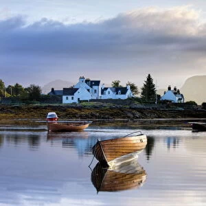 Dawn view of Plockton with rowing boats and whitewashed houses, Plokton