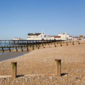 Deserted pebble beach at low tide and pier from east side, Bognor Regis