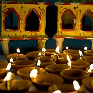 Diwali deepak lights (oil and cotton wick candles) and shrine decorations, India, Asia