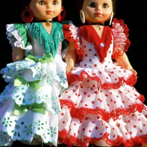 Two dolls dressed in Spanish costume