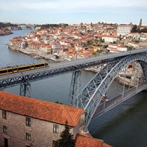 The Dom Luis 1 Bridge over the River Douro showing Porto Metro light rail in transit and Arrabida Bridge in background, Porto (Oporto), Portugal, Europe