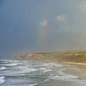 Double rainbow after storm at Carrapateira Bordeira beach, Algarve, Portugal, Europe