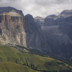 The dramatic Sass Pordoi mountain in the Dolomites near Canazei, Trentino-Alto Adige, Italy, Europe