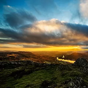 Dramatic sunset from Gummers How and view across Windermere towards the Furness fells, Lake District National Park, UNESCO World Heritage Site, Cumbria, England, United Kingdom, Europe