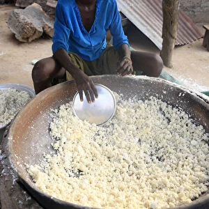 Drying the cassava in the African village of Datcha, Togo, West Africa, Africa