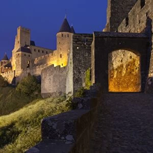 Dusk at the entrance to La Cite in Carcassonne, UNESCO World Heritage Site, Languedoc-Roussillon, France, Europe