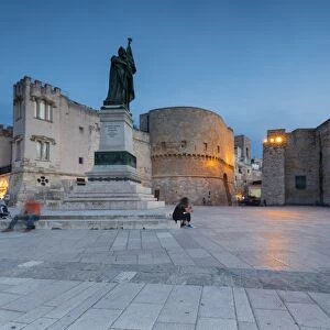 Dusk lights on the medieval fortress and squares of the old town, Otranto, Province of Lecce