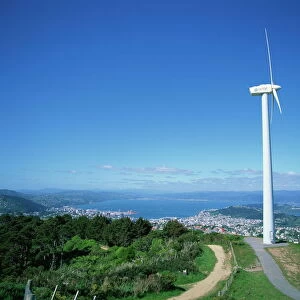 ECNZ Wind turbine generator on a hill above the city