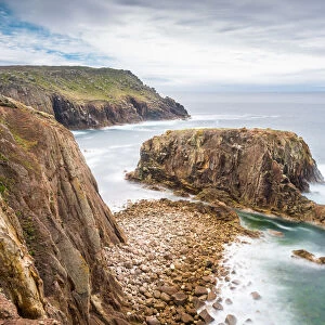 Enys Dodnan rock formation at Lands End, Cornwall, England, United Kingdom, Europe