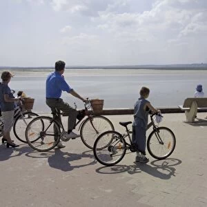 Family on bicycles, Le Crotoy, Somme Estuary, Picardy, France, Europe